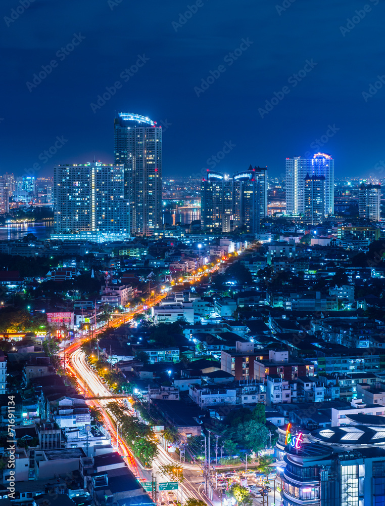 Night view of Charoen Nakhon Road in Bangkok, Thailand