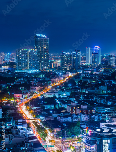Night view of Charoen Nakhon Road in Bangkok, Thailand
