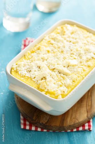 Polenta with fresh cheese photo