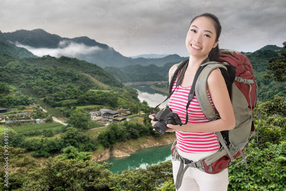 backpacker with camera