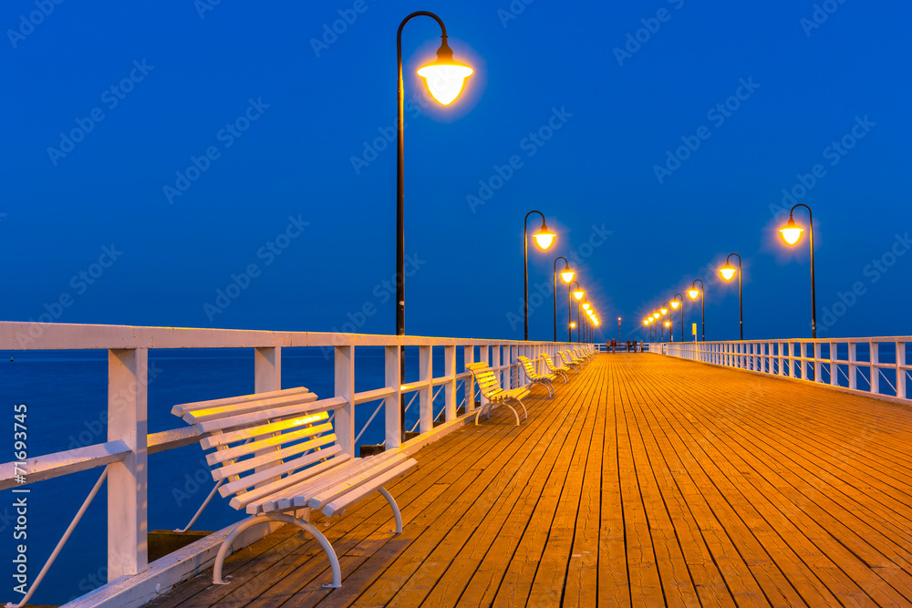 Fototapeta premium Wooden pier at Baltic sea in Gdynia Orlowo, Poland