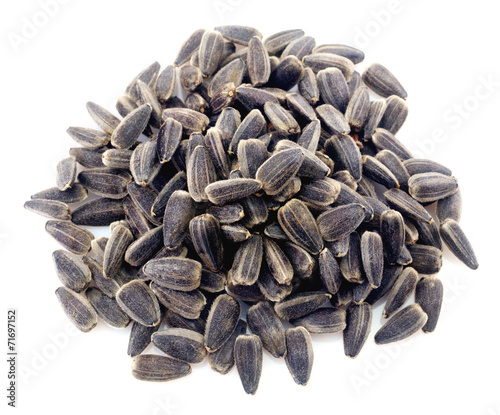 Fotografie Sunflower seeds isolated on white