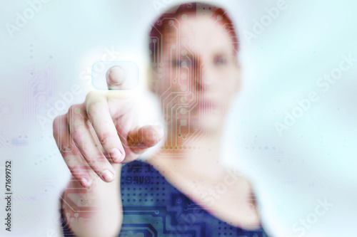Woman pressing a touch panel