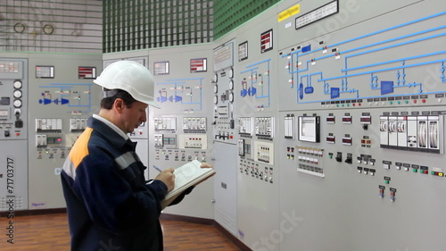 engineer writes technological parameters of control panel in log
