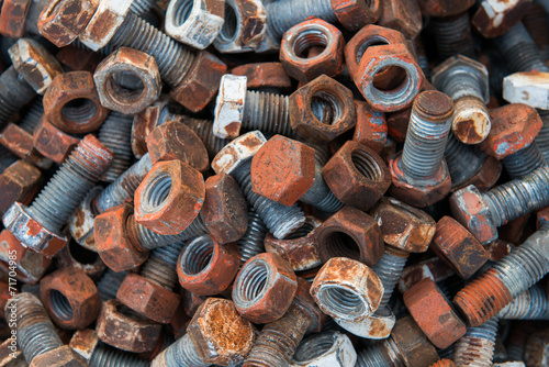 Rusty steel nuts and screws