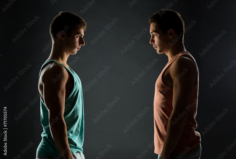 young men looking to each other young men looking to each other
