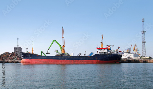 Loading of big Industrial cargo ship in Burgas port, Bulgaria