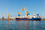 Industrial cargo ship is loading in Burgas port