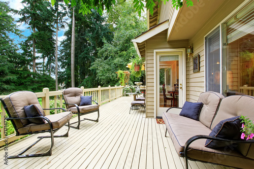 Spacious walkout deck with sitting area