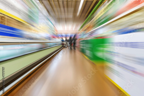 Wide perspective of empty supermarket aisle
