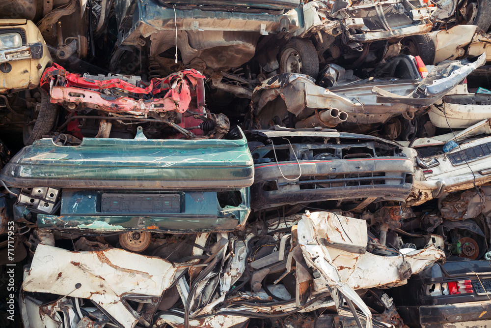 Abstract background with dump of stacked cars in junkyard Abstract background with dump of stacked cars in junkyard