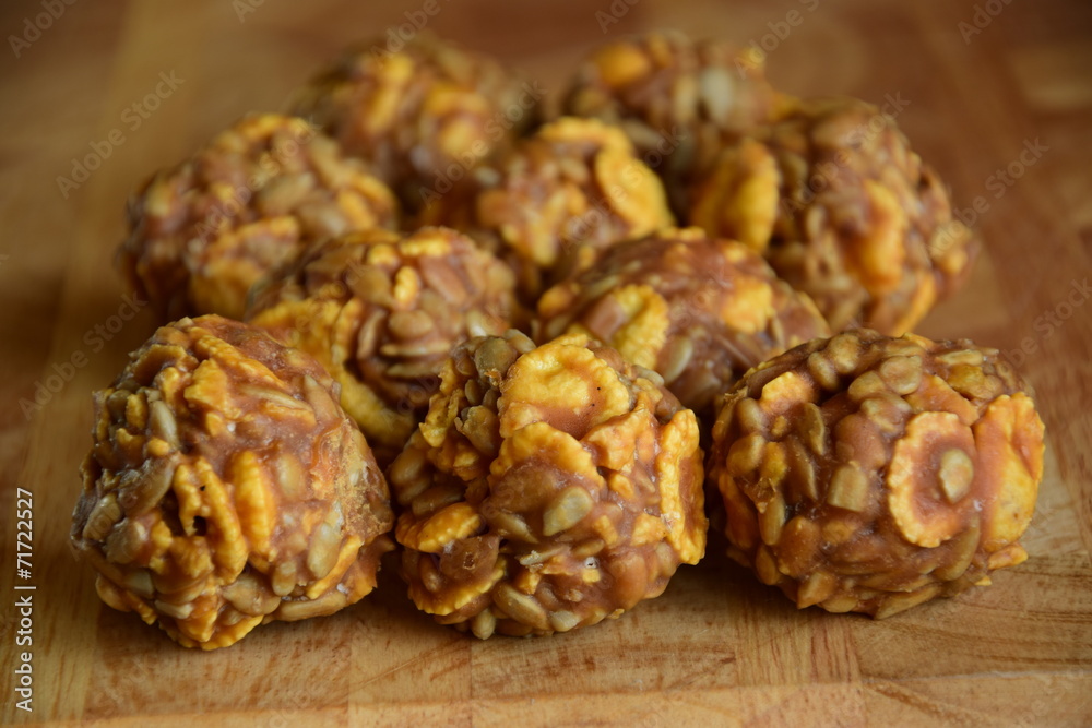 Round sweet specialities with flakes and caramel Round sweet specialities with flakes and caramel