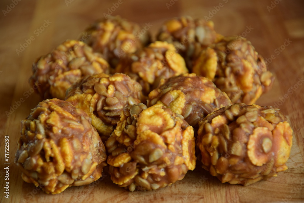 Round sweet specialities with flakes and caramel Round sweet specialities with flakes and caramel