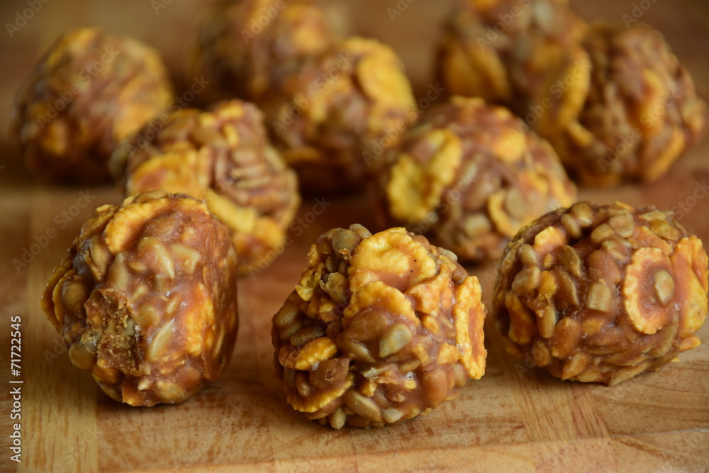 Round sweet specialities with flakes and caramel Round sweet specialities with flakes and caramel