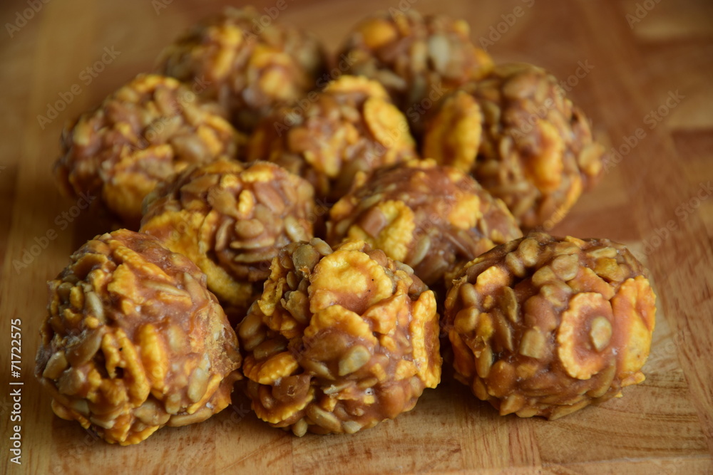 Round sweet specialities with flakes and caramel Round sweet specialities with flakes and caramel