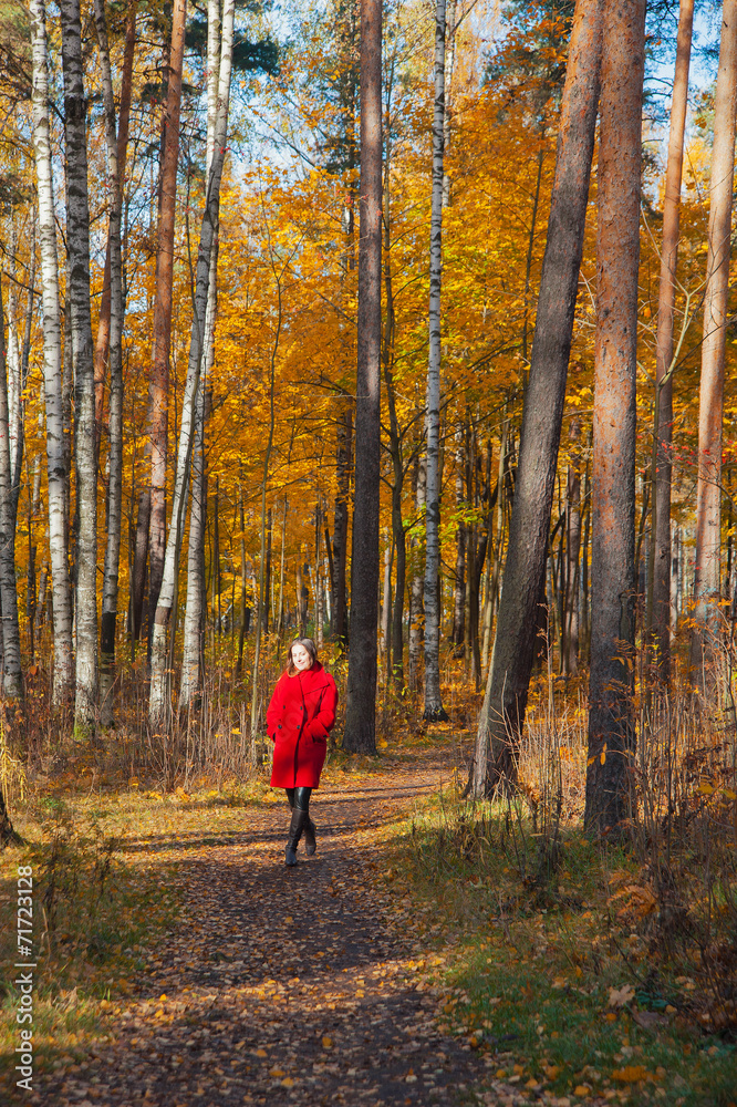 Fototapeta premium Woman enjoying autumn