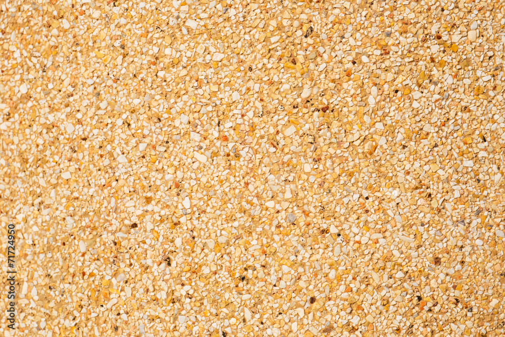 Gravel texture on brown concrete wall Gravel texture on brown concrete wall