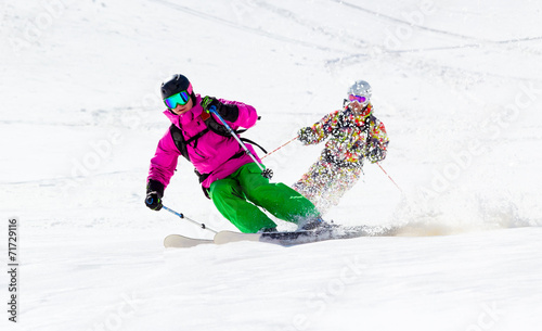 Two Skiers on mountain slope off piste