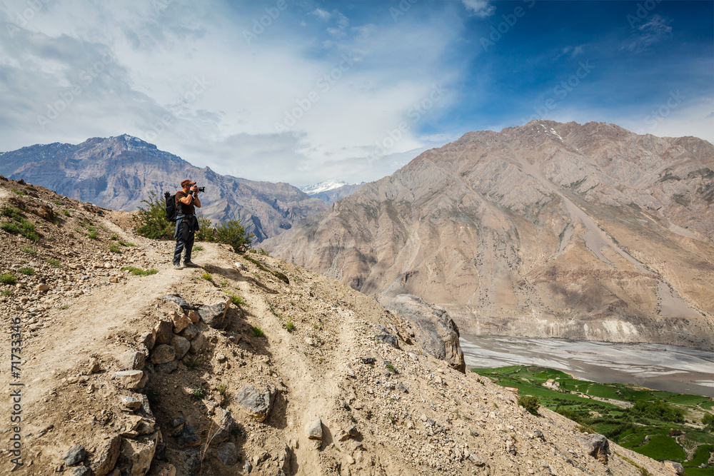 Photographer taking photos in Himalayas