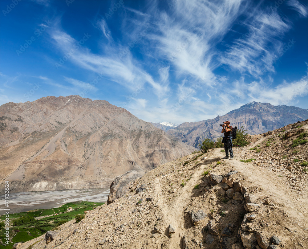 Photographer taking photos in Himalayas