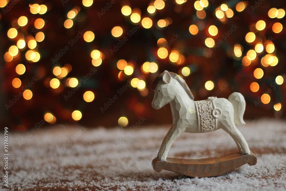 rocking horse on christmas background