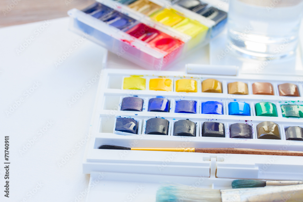 set of watercolor paints with brushes set of watercolor paints with brushes