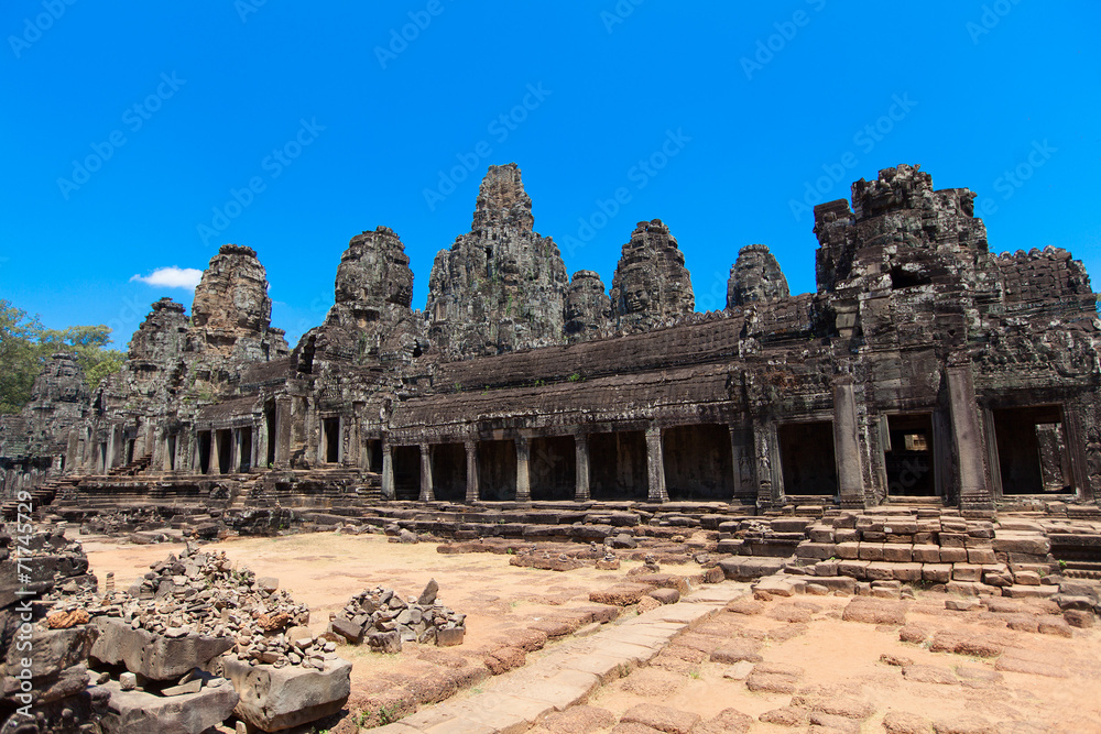 The ancient ruins of a historic Khmer temple in the temple compl