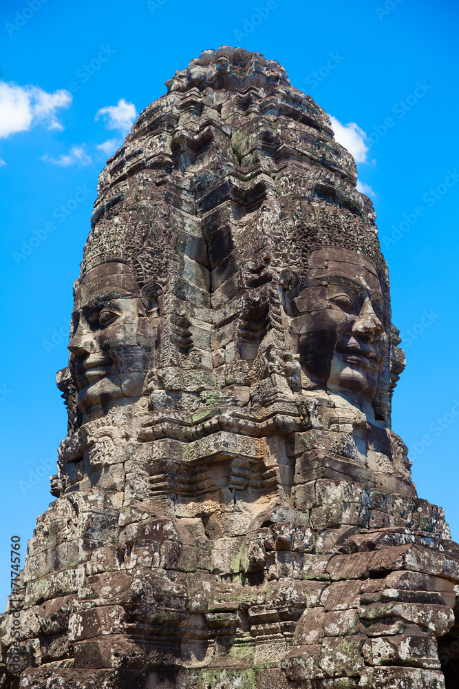 Fototapeta premium The ancient ruins of a historic Khmer temple in the temple compl