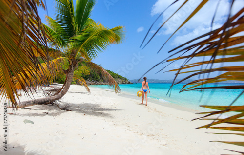 Young woman walking at beach