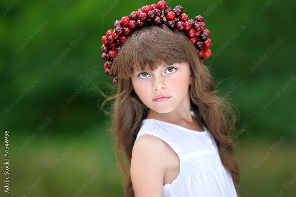 portrait of little girl with a wreath of cherry portrait of little girl with a wreath of cherry