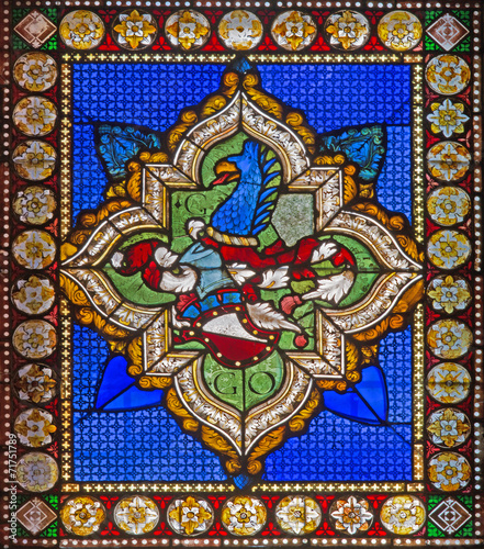 Bologna - symbolic dragon from heraldry on windowpane