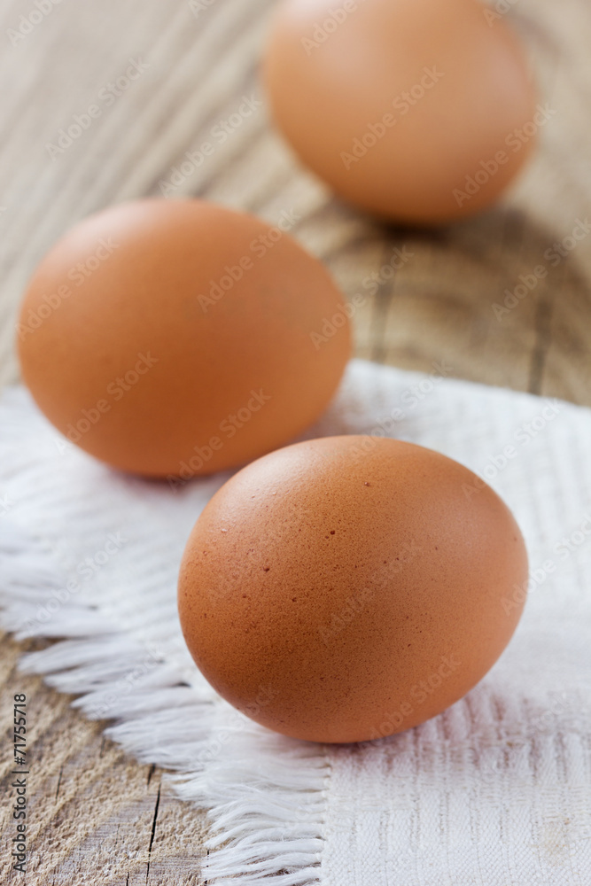 Chicken eggs on old table, rustic style Chicken eggs on old table, rustic style