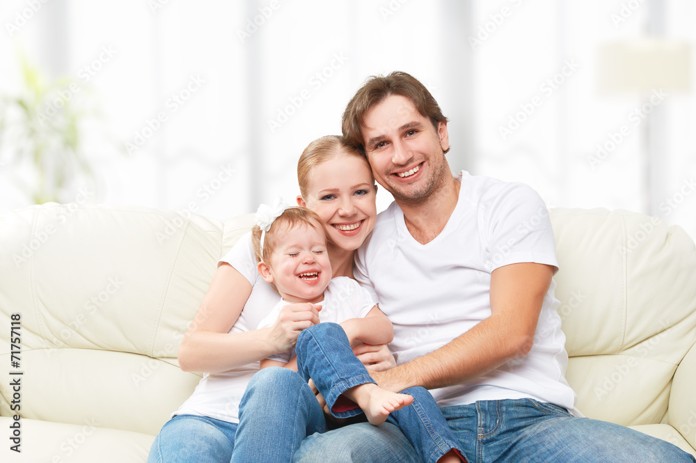 Happy family mother, father, child baby daughter at home