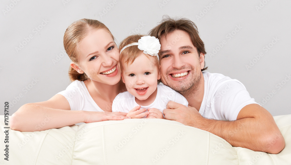 Happy family mother, father, child baby daughter at home Happy family mother, father, child baby daughter at home