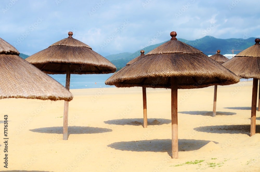 Beach umbrellas at the beach Beach umbrellas at the beach
