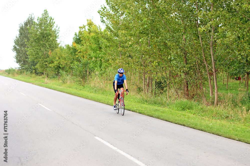 male cyclist on a fast race bike