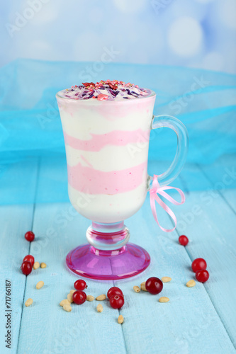 Cranberry milk dessert in glass,