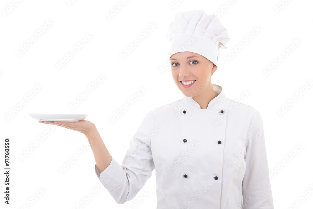 young woman chef in uniform with empty plate isolated on white young woman chef in uniform with empty plate isolated on white