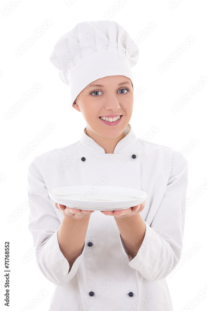 young woman chef in uniform showing empty plate isolated on whi young woman chef in uniform showing empty plate isolated on whi