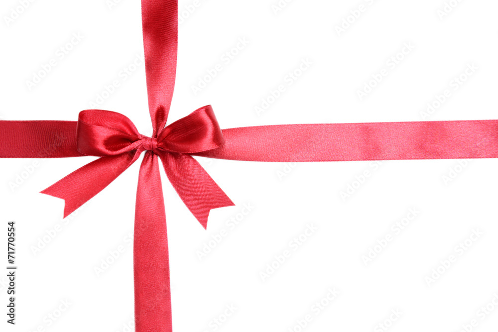 Shiny red ribbon with bow isolated on white Shiny red ribbon with bow isolated on white