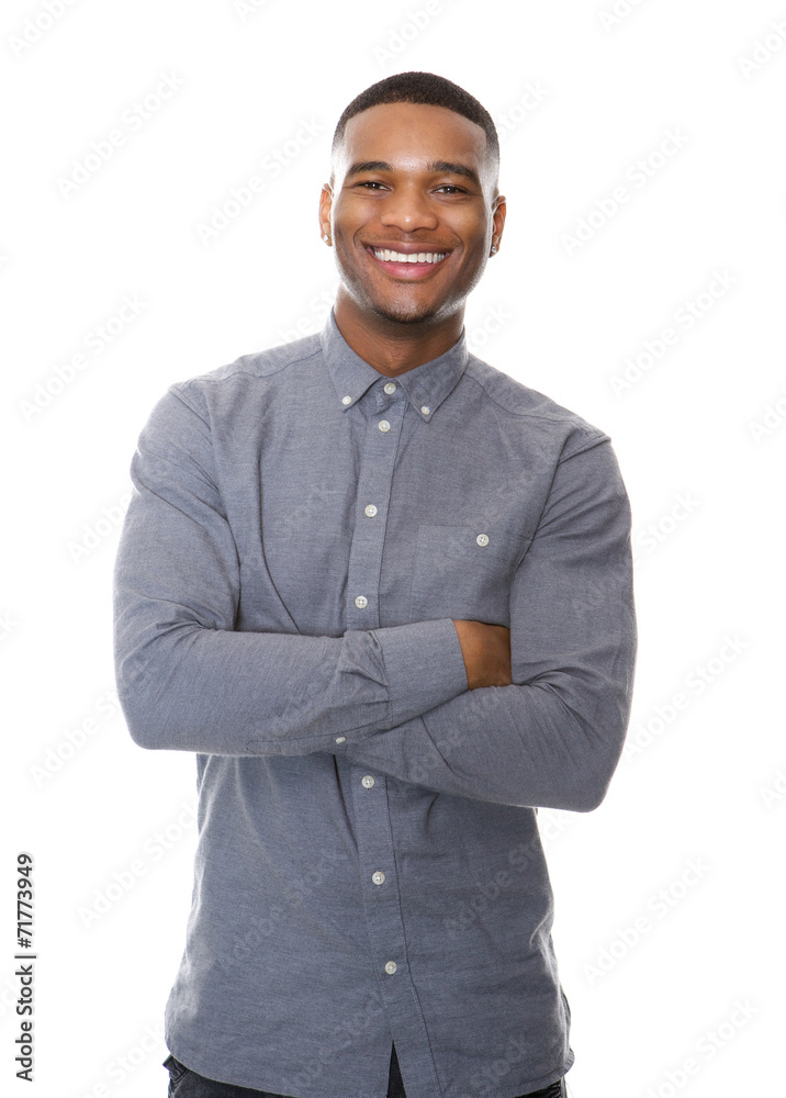 Cheerful african american man smiling with arms crossed Cheerful african american man smiling with arms crossed