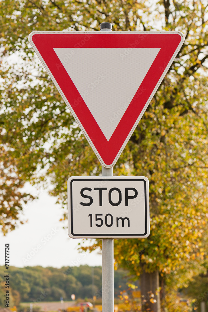 Verkehrsschild - Vorfahrt gewähren - Stop in 150 m Stock Photo | Adobe Stock