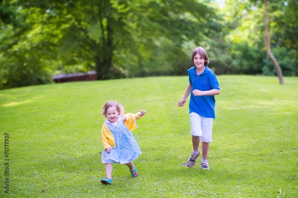 Happy kids running in a park