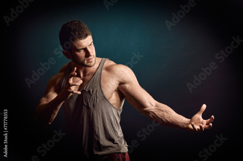 athletic young man portrait in studio © bereta
