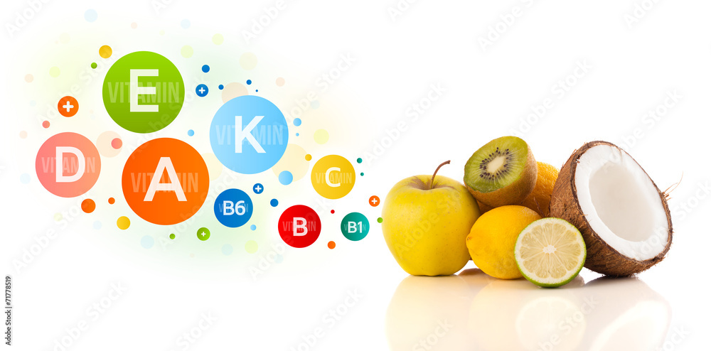 Healthy fruits with colorful vitamin symbols and icons