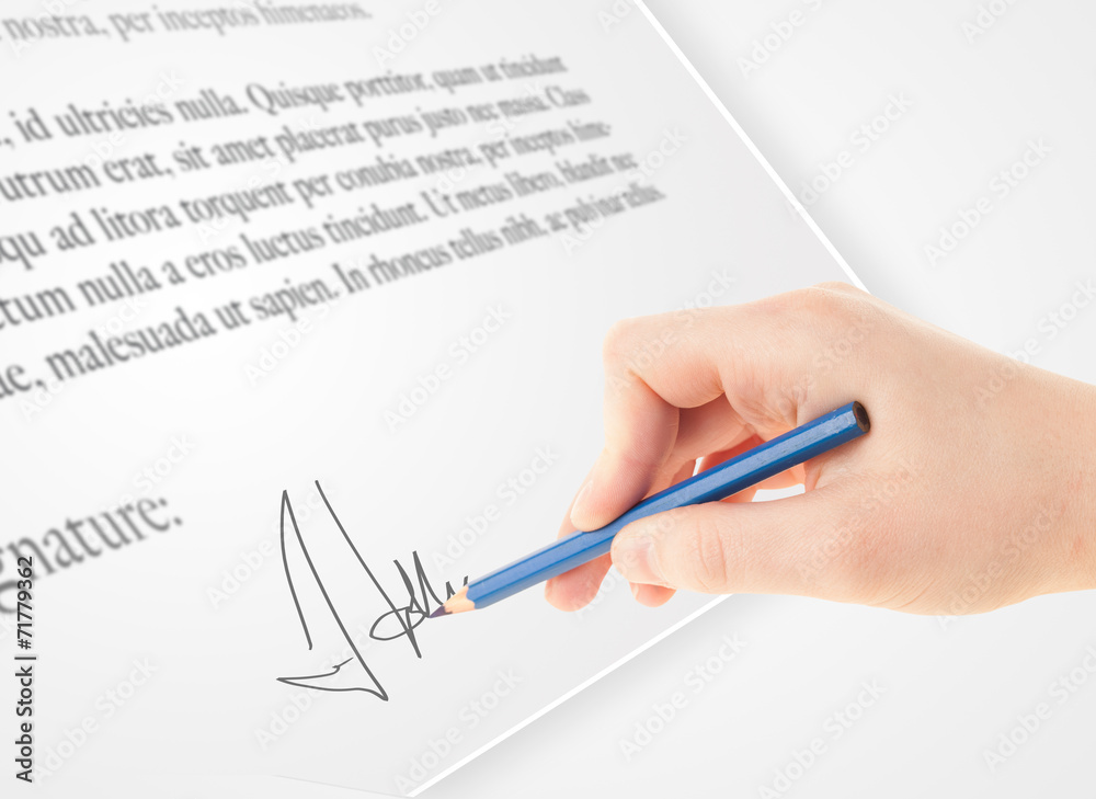 Hand writing personal signature on a paper form Hand writing personal signature on a paper form