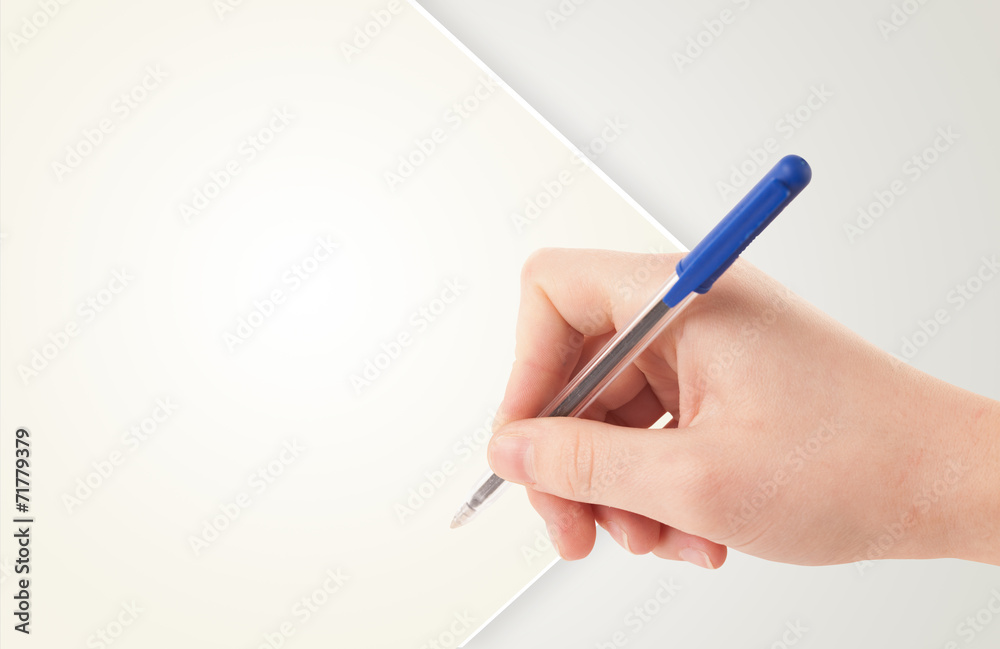 Hand writing on plain empty white paper copy space Hand writing on plain empty white paper copy space