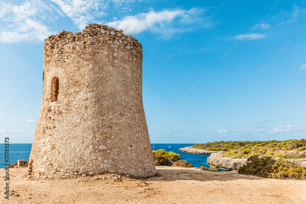 Medieval watchtower on the coast of Cala Pi