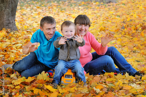 happy family in the park in autumn