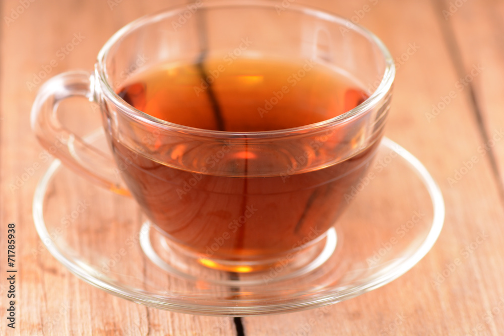 A cup of tea on wooden background